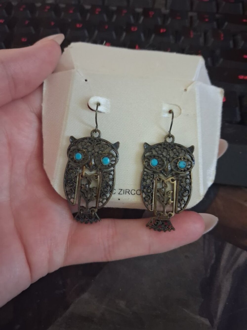 Owl dangle earrings